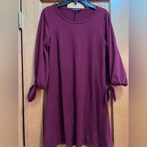 girls wine/purple casual dress with tie on end of sleeve